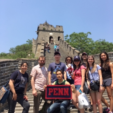 Photo Of Penn Students and Faculty Standing In Front Of The Great Wall Of China